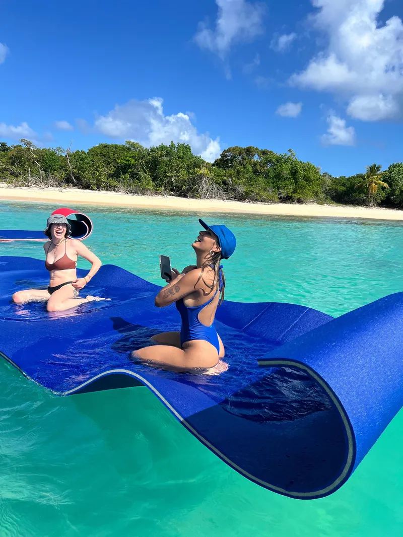 A luxury sailing catamaran gliding toward Icacos Island on a premium all-inclusive boat tour from Fajardo, Puerto Rico